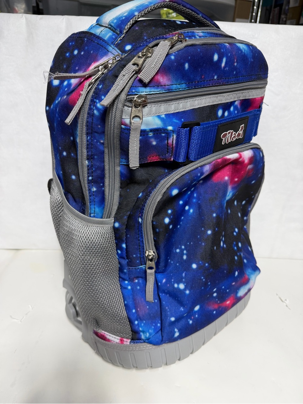 Tilami Deep Blue Galaxy Rolling Backpack 19 inch - pre owned condition